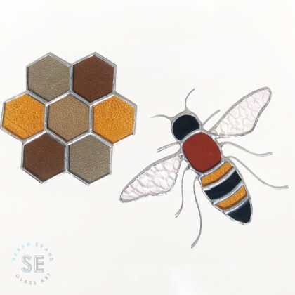 Sarah Evans Glass Art stained glass honey bee and honeycomb. 